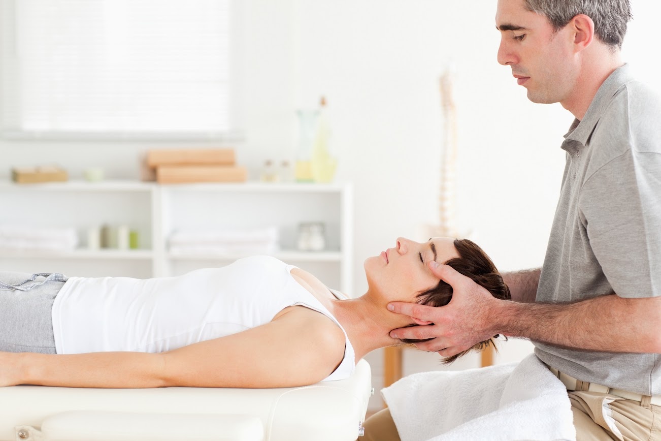 Patient being adjusted